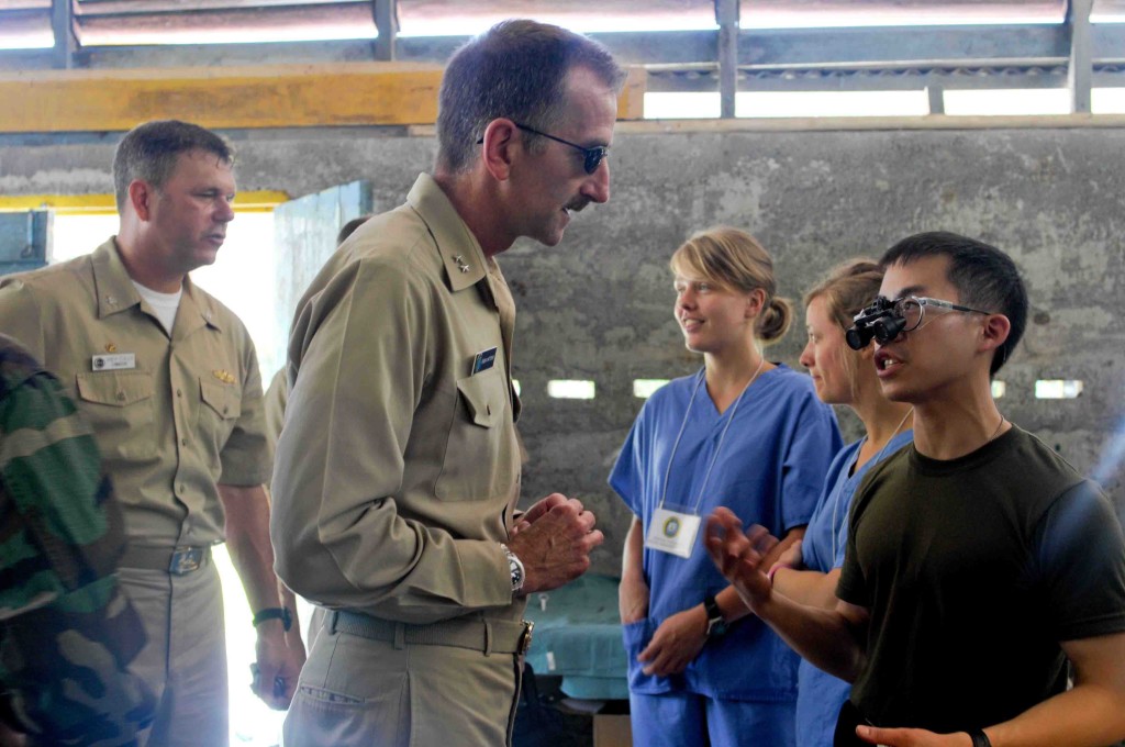 Visale, Solomon Islands (Aug. 08, 2009) U.S. Navy Rear Adm. Robin M. Watters, left, reserve deputy and Chief of Staff, U.S. Pacific Fleet, greets Canadian dentist Army Capt. Jason Yee during a Pacific Partnership 2009 medical civic action project.  Pacific Partnership is the dedicated humanitarian and civil assistance mission conducted with a variety of partners to execute humanitarian civic action missions in the Pacific Fleet area of responsibility. (U.S. Navy photo by Mass Communication Specialist 2nd Class Joshua Valcarcel/Released)